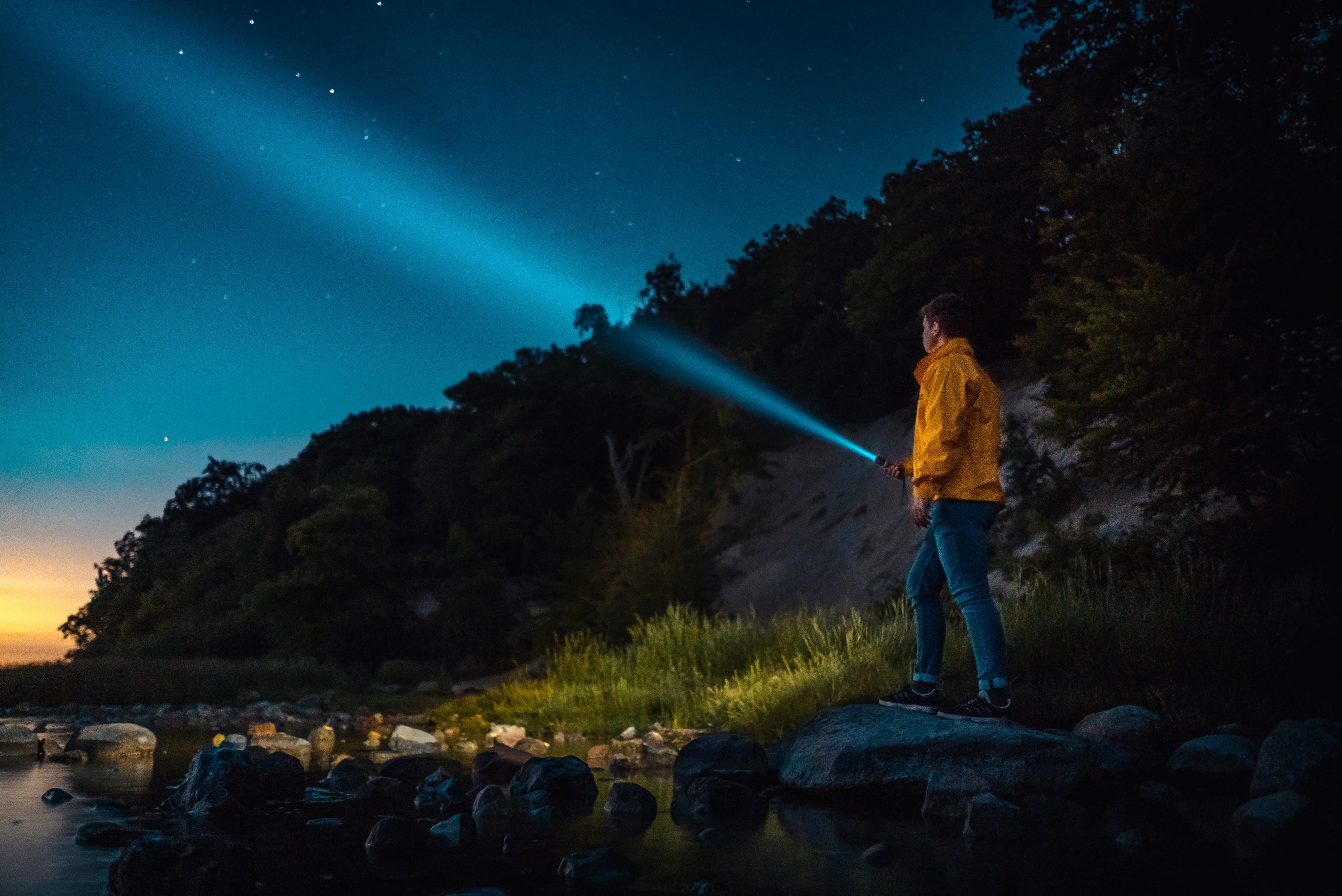 man holding a flashlight